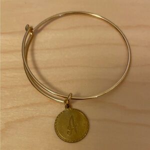 Gold plated cuff bracelet with initial A charm